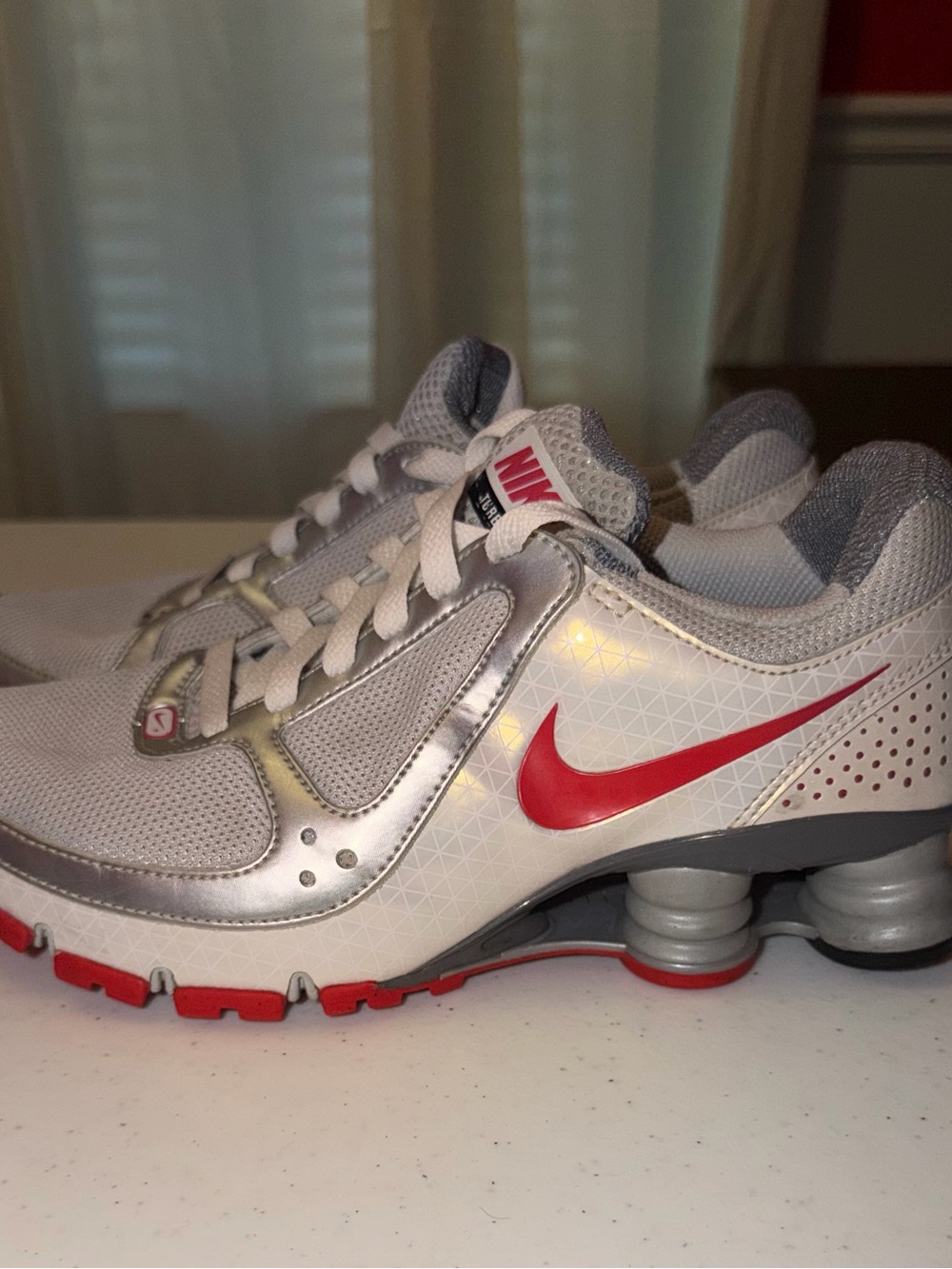 Nike Women’s Gray and Red Running Sneakers